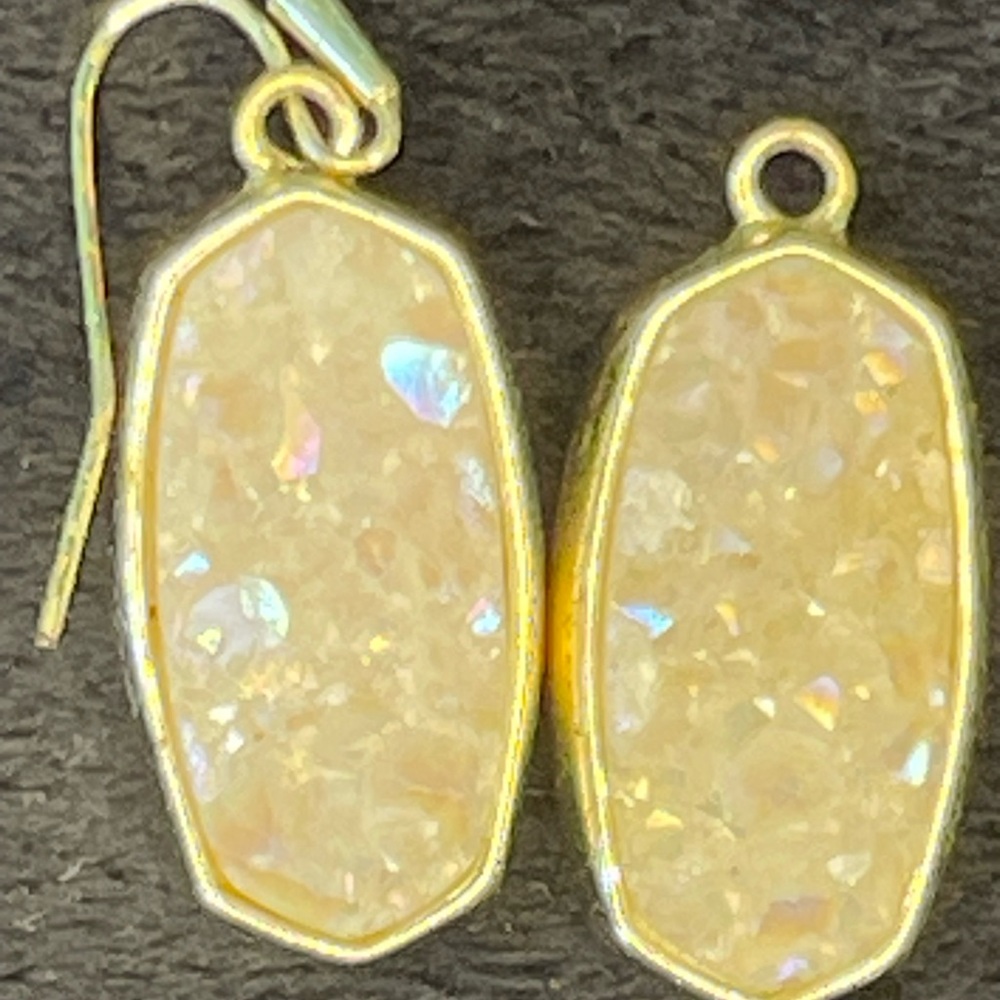 Kendra Scott gold and druzy crystals earrings.